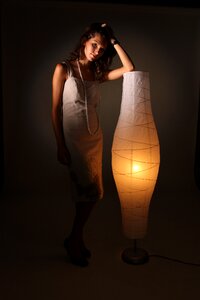 Woman darkness lamp photo