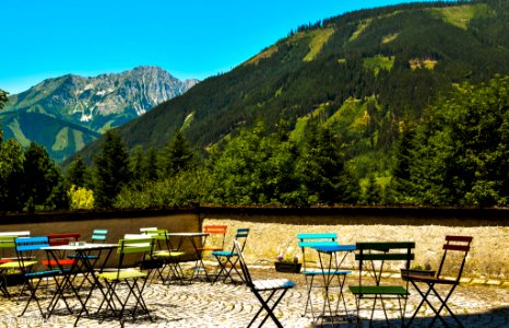 Chairs In Many Different Colors Outside Of A Restaurant Alps Austria (182682733)