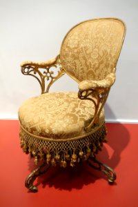 Centripetal Spring chair by Thomas E. Warren, patented September 25, 1849, made by the American Chair Company, Troy, New York, cast iron, sheet metal, wood, original fringe- Brooklyn Museum - Brooklyn, NY - DSC08852