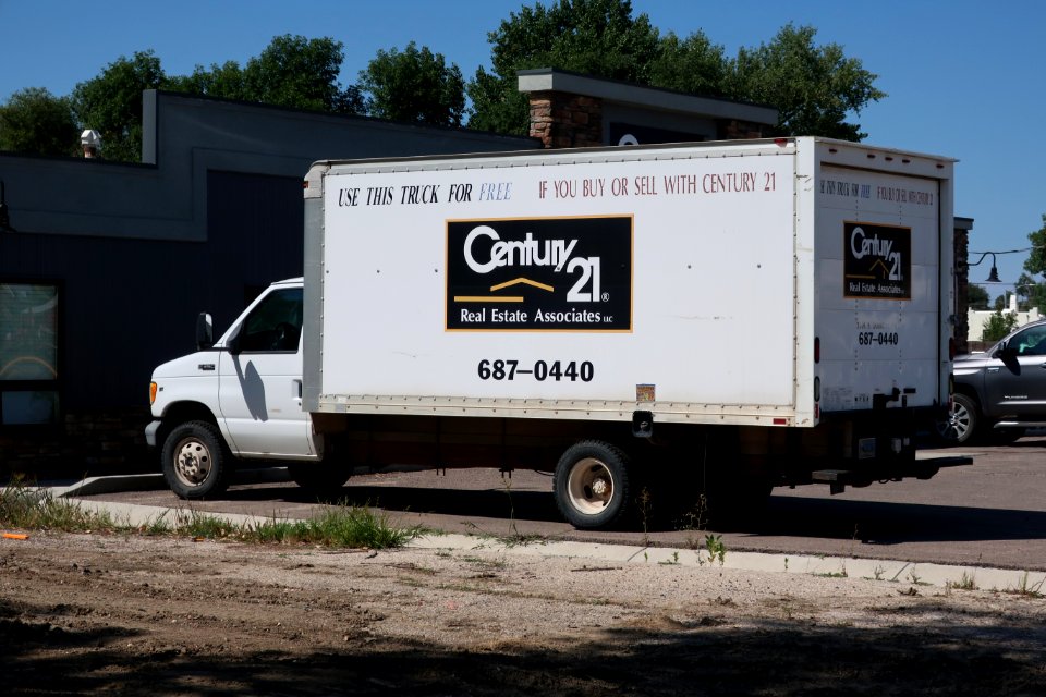 Century 21 Real Estate branded Ford E-350 moving truck in Gillette, Wyoming