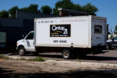 Century 21 Real Estate branded Ford E-350 moving truck in Gillette, Wyoming