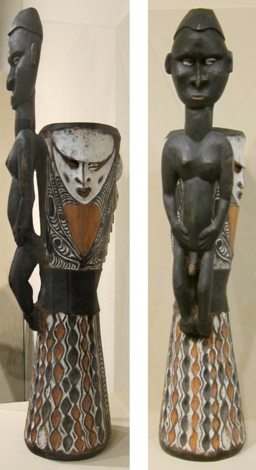 Ceremonial water drum, Papua New Guinea, Chambri Lakes region, carved wood, natural pigments and cowrie shells