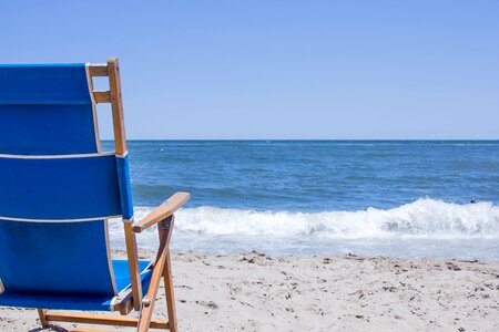 Ocean chair blue sand photo