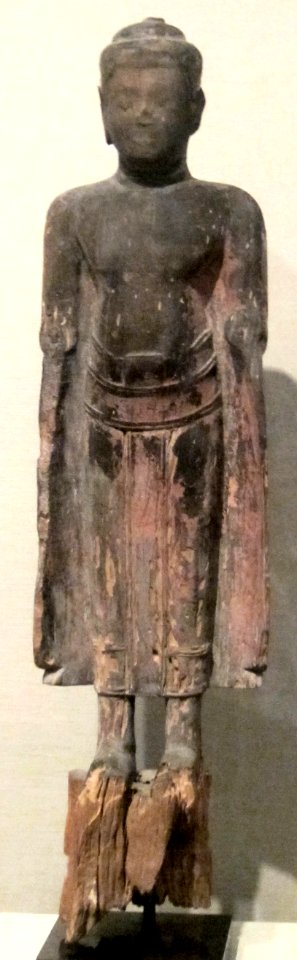Cambodian standing Buddha, late Angkor period, 13th century, wood and lacquer, promised gift to HAA