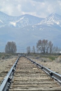 Dreary vanishing point rail track photo