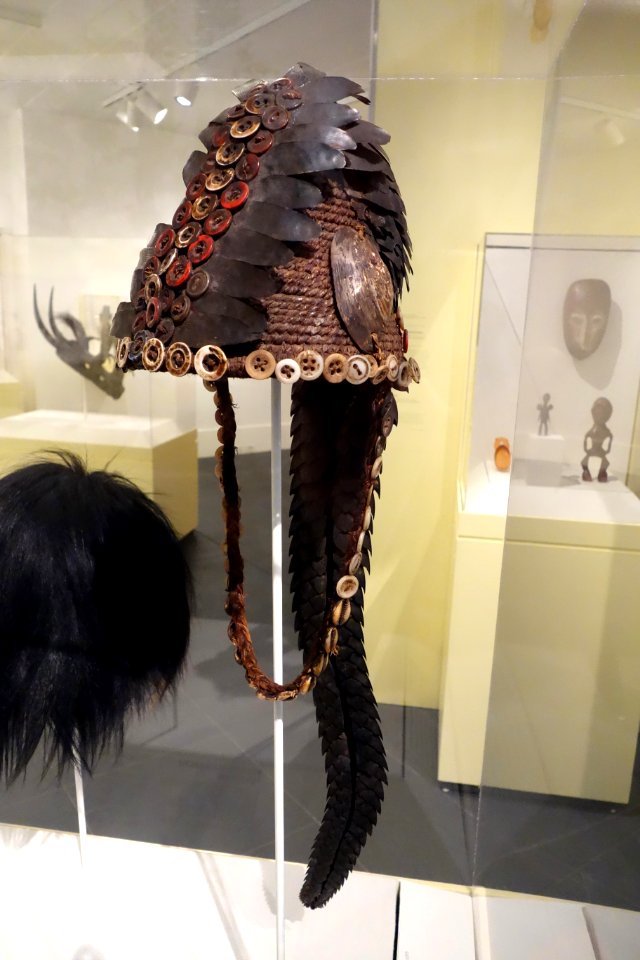 Bwami hat for Ngandu or Yananio level, Lega, South Kivu or Maniema province, DR Congo, early 20th century, plant fiber, shells, buttons, pangolin scales and tail - Brooklyn Museum - Brooklyn, NY - DSC08476