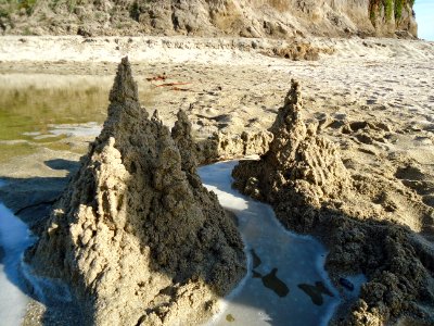 California sandcastle with bridge near creek