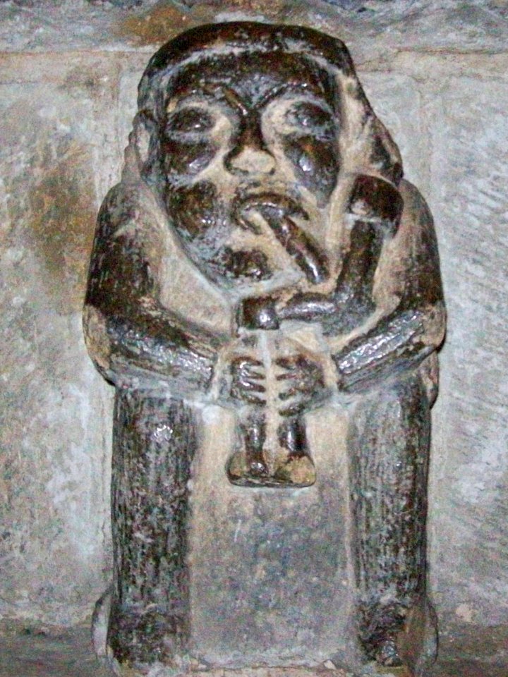 Carving of piper, Hexham