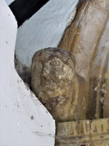 Carved head, St Mary, Sompting 01 photo