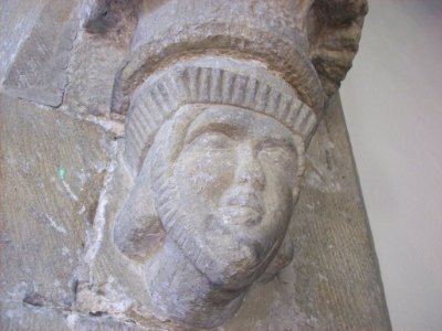 Carved head (female) St. Leonard Monyash
