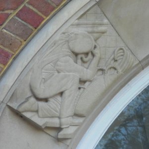 Carved Relief by Joseph Cribb at 20–22 Marlborough Place, Brighton (Plumber)