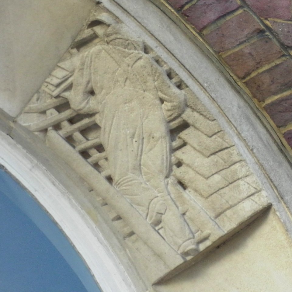 Carved Relief by Joseph Cribb at 20–22 Marlborough Place, Brighton (Roofer)