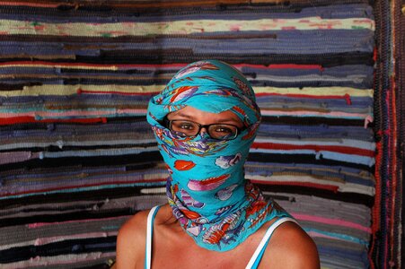 In the desert woman wreathed