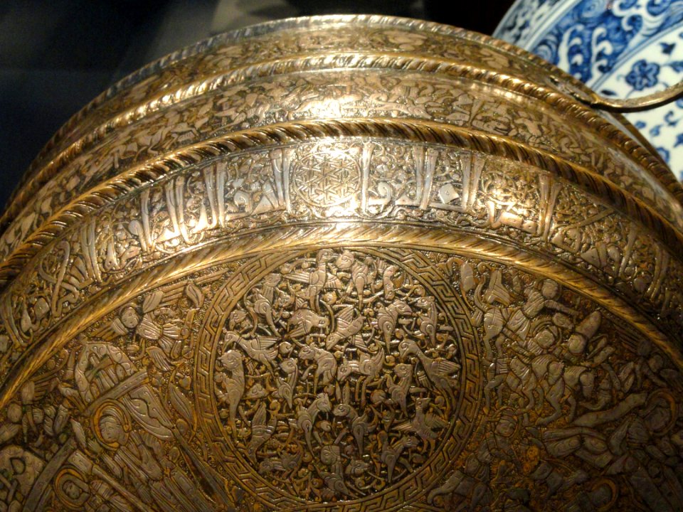 Canteen with Christian and Islamic motifs, probably northern Iraq, mid 13th century AD, brass inlaid with silver, view 2 - Freer Gallery of Art - DSC05399