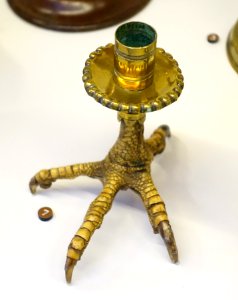 Candlestick, 1800s, brass and eagle's claw - Nordiska museet - Stockholm, Sweden - DSC00045