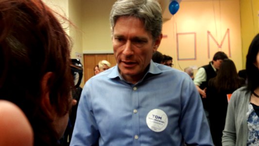Candidate for Congress NJ-7th Tom Malinowski at campaign headquarters speaking with voter