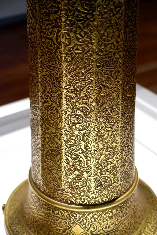 Candlestick made by 'Abd ol-Vahhab b. Elah-Dad for Sheykh Abo'l-Hasan b. Sheykh Nader-Qoli, Iran, early to mid 16th century AD, brass with black compound, view 2- Aga Khan Museum - Toronto, Canada - DSC07001