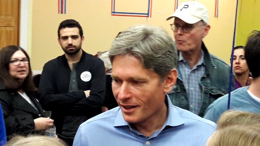 Candidate for Congress NJ-7th Tom Malinowski at campaign headquarters speaks with voter