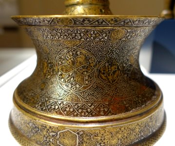 Candlestick, western Iran, late 13th to early 14th century AD, cast brass, silver and gold inlay, view 2 - Aga Khan Museum - Toronto, Canada - DSC06604