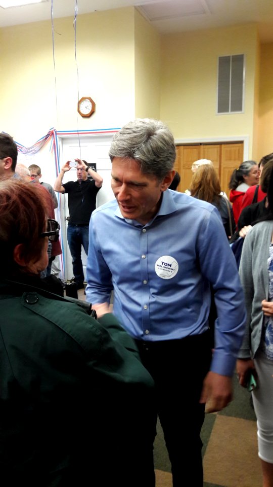 Candidate for Congress NJ-7th Tom Malinowski at campaign headquarters speaking with a voter