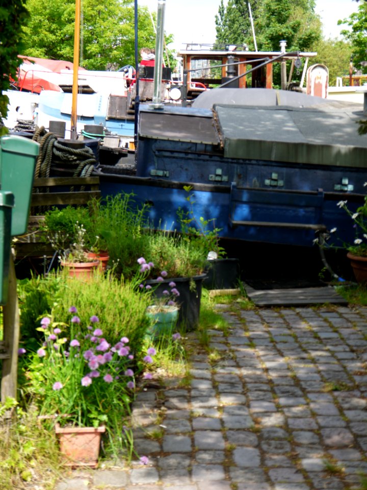 Close up photo of mailboxes of houseboats on the Prins Hendrikkade, east side of Central Station, Amsterdam;