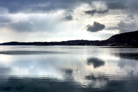 Clouds reflected in Brofjorden 2 photo