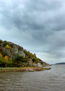 Cliff in Sandvik in the rain 2 photo