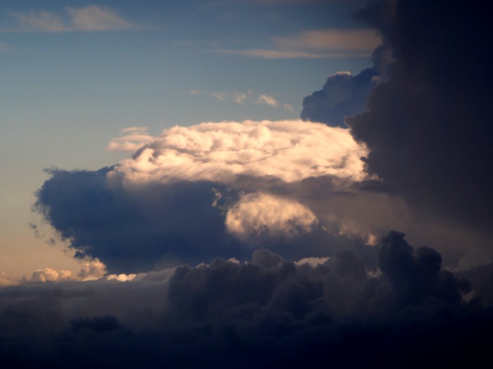 Cloudformations near the base of Cumulonimbus from an airplane at 32000ft