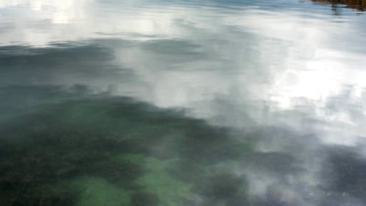 Clouds reflected in Brofjorden 4 photo