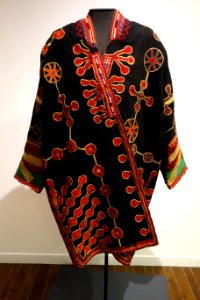 Coat, Mangal Pashtun people, Afghanistan, view 1, early to mid 20th century, wool, cotton, silk, metal thread, glass and plastic beads - Textile Museum of Canada - DSC00922