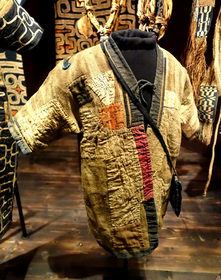 Coat for small child, Ainu people, Japan, woven from inner bark of elm tree, repaired with cotton - Etnografiska museet - Stockholm, Sweden - DSC01166
