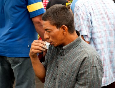 Coffee drinking vegetable seller photo