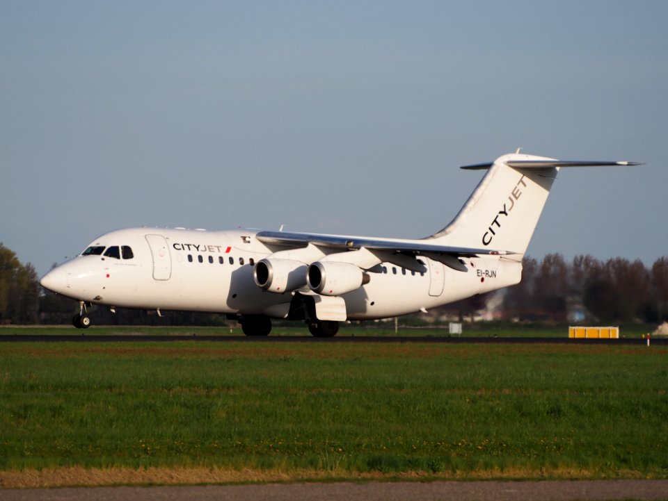 CityJet EI-RJN BAe 146 - Avro RJ takeoff from Polderbaan, Schiphol (AMS - EHAM) at sunset, pic1