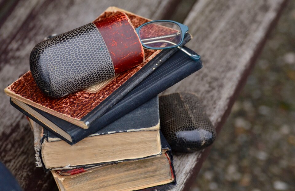 Glasses glasses case old books