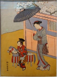 Child playing on a wooden horse and a beauty with an umbrella, by Suzuki Harunobu, Edo period, 1700s AD, print - Ishikawa Prefectural Museum of Traditional Arts and Crafts - Kanazawa, Japan - DSC09547