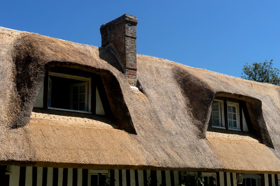 Chimney windows thatched roof Normandy