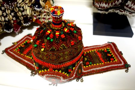 Child's hat, Indus Kohistan, Northwest Frontier Province, Pakistan, early to mid 20th century, cotton, silk, glass beads, mother-of-pearl, plastic buttons - Textile Museum of Canada - DSC00919