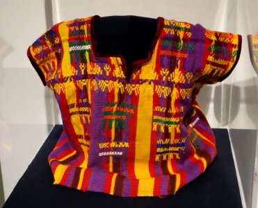 Child's or saint's huipil, Kaqchikel Maya, San Juan Sacateqequez, mid 20th century, cotton and silk - Textile Museum of Canada - DSC01144