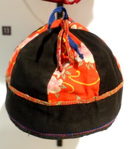 Child's cap, Nung, Son Duong, Bac Giang, 1990 - Vietnamese Women's Museum - Hanoi, Vietnam - DSC04338