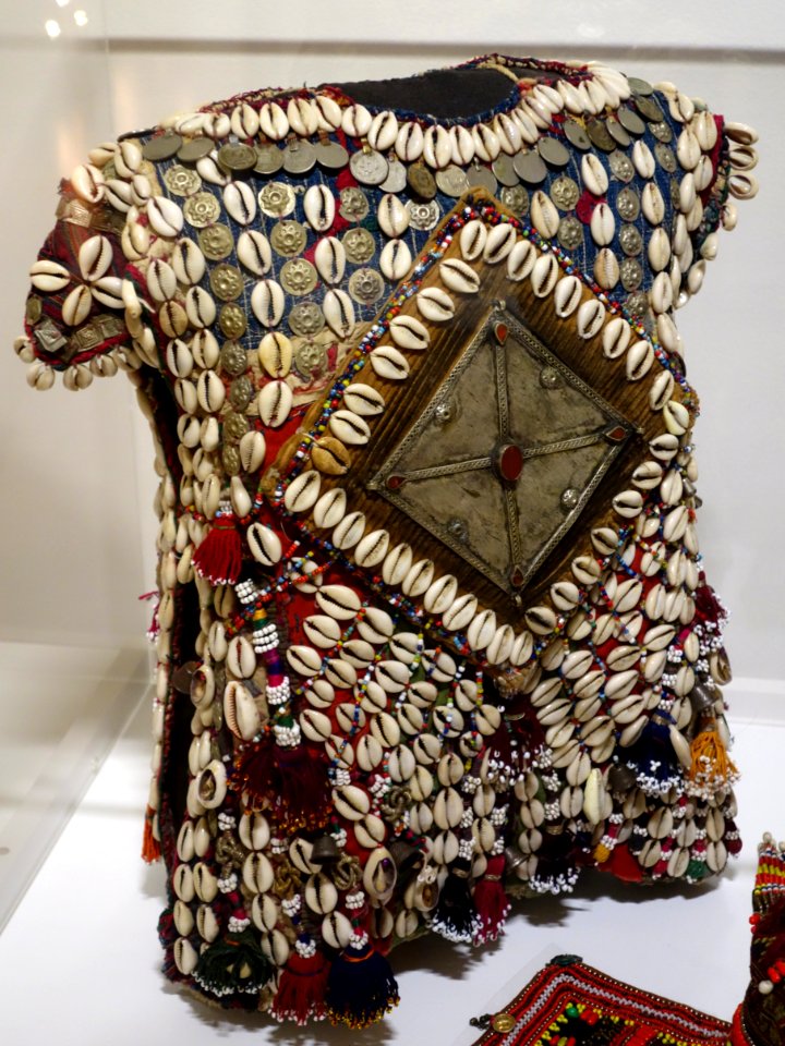 Child's tunic, Yomud Turkmen people, Northern Afghanistan , early to mid 20th century, wool, cotton, metal, cowrie shells, glass beads - Textile Museum of Canada - DSC00915