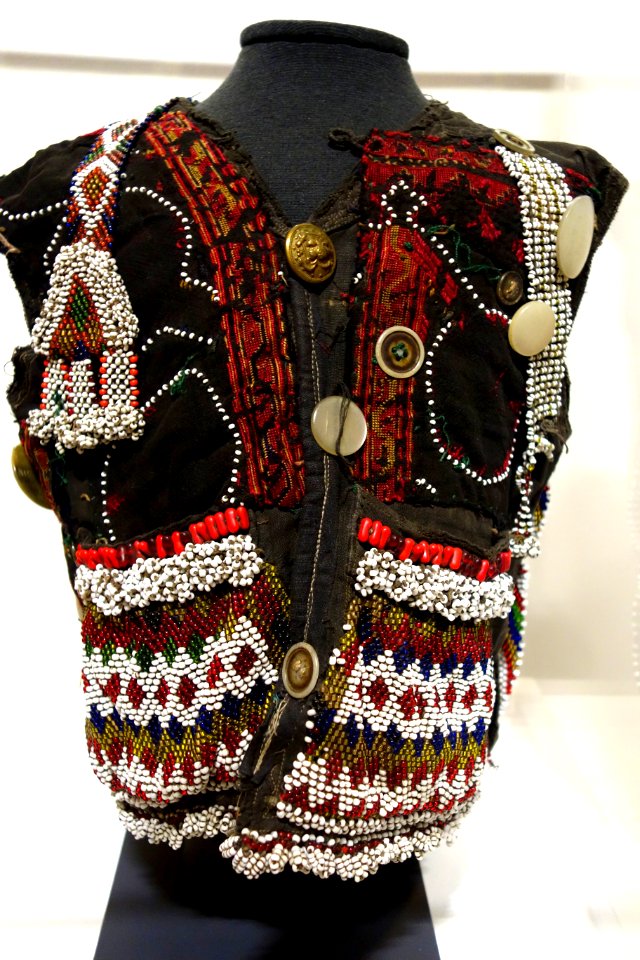 Child's vest, Indus Kohistan, Northwest Frontier Province, Pakistan, early to mid 20th century, cotton, silk, glass beads, mother-of-pearl, plastic buttons - Textile Museum of Canada - DSC00917