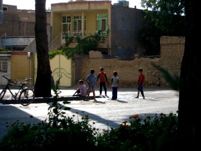 Children playing with water in 17 Shahrivar street rill - Nishapur 3