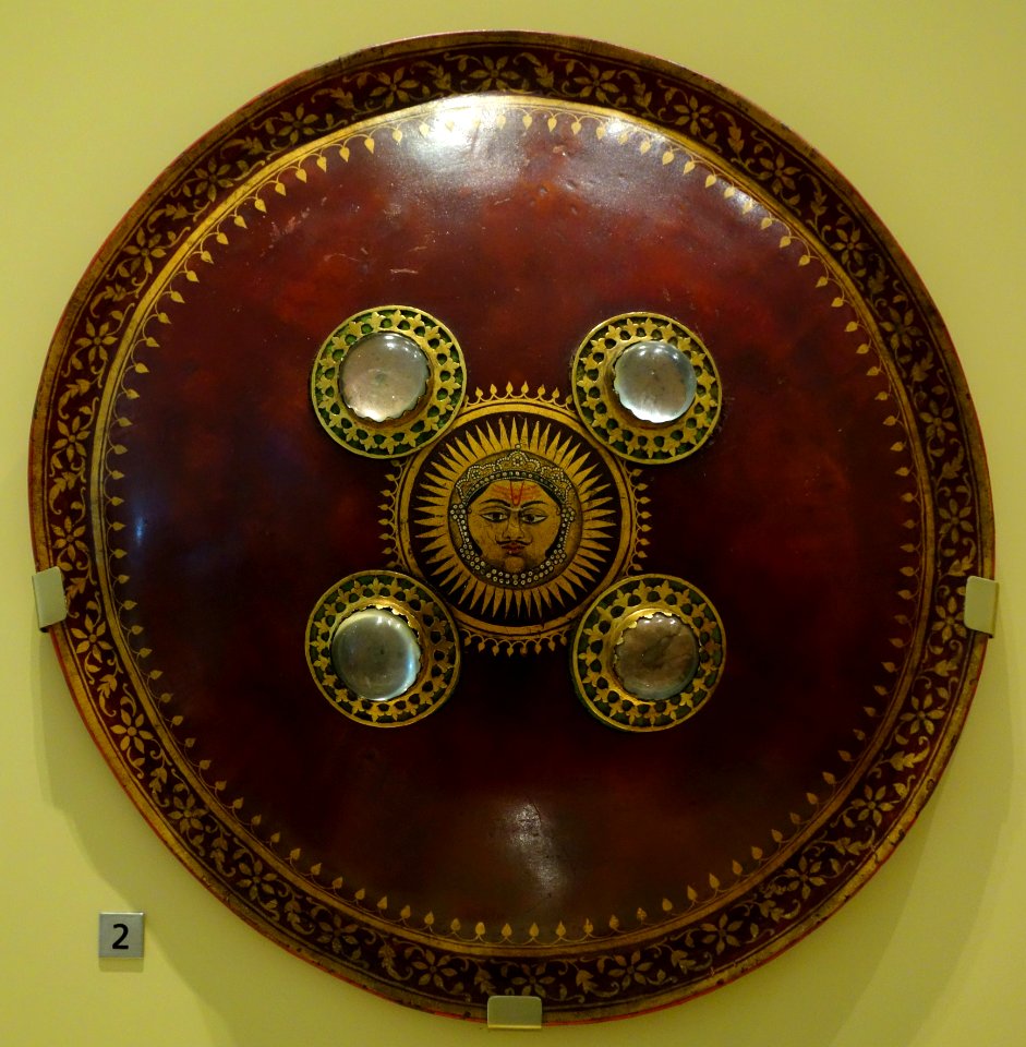 Charma dhal (shield), India, Rajasthan, Mughal period, 18th century, buffalo hide, brass, rock crystal, bronze, enamel, gold paint, lacquer - Royal Ontario Museum - DSC04545