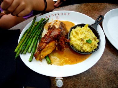 Chicken and asparagus and mashed potatoes served on a plate at a restaurant in Maryland photo