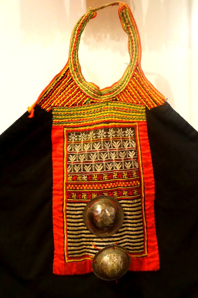 Chest cover with swastika patterns, Dao Thanh Phan, Quang Ninh, 1984, with aluminum cones - Vietnamese Women's Museum - Hanoi, Vietnam - DSC03726