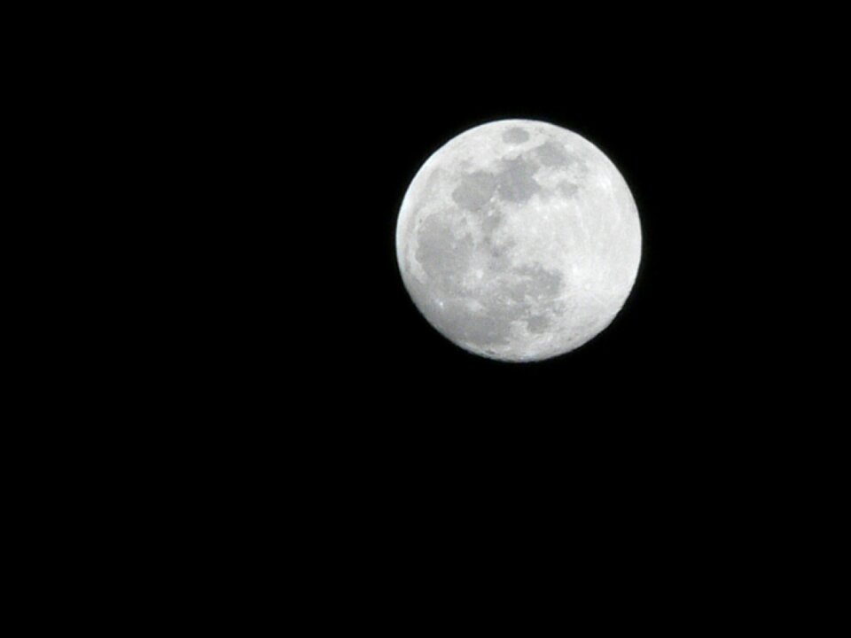 Full moon night sky crater