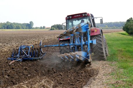 Agriculture kombi plow flat land photo