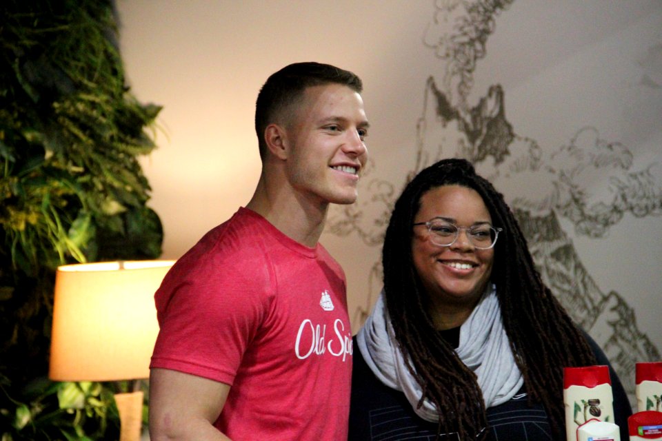 Christian McCaffrey with fan, Jan 2019