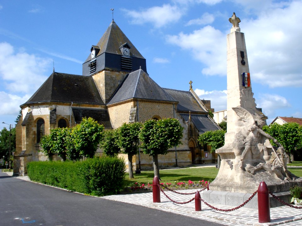 Church and war memorial at Juniville (Ardennes, Fr)