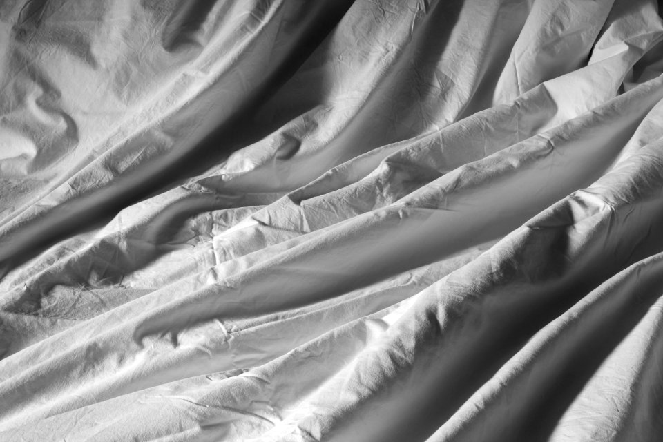Crumpled duvet covered with a white cotton duvet cover 3